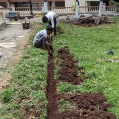 To install an underground irrigation system, we begin by digging trenches about six inches deep to lay the pipes.