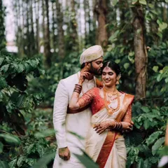 A quiet moment of connection amidst the beautiful chaos of a wedding day. I look for these natural interactions that truly define your relationship, set against the stunning backdrop of your celebration.