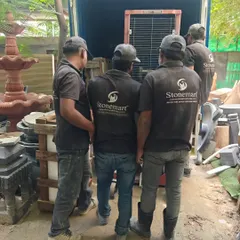 Our team loading dispatched shipments into a truck. We take great care in handling and transporting our stone masterpieces to clients across India and the world.