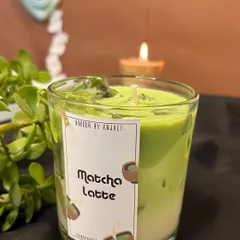 A close-up of the Matcha Latte candle from my collection. The vibrant green and creamy white layers topped with wax "ice" make it a treat for the eyes and nose.