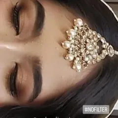 A view of the engagement makeup with eyes closed to show the smooth blending of the eyeshadow. This demonstrates the clean and precise application that ensures the makeup looks great both up close and from a distance.
