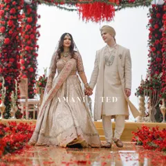 The grand walk down an aisle of roses at a breathtaking Goa wedding. I focus on capturing the scale and beauty of your day, ensuring every detail of your magnificent celebration is preserved forever.
