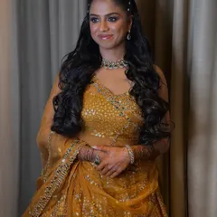 A portrait of the bride ready for her Sangeet. The airbrush makeup ensures she looks fresh and glamorous all night long.