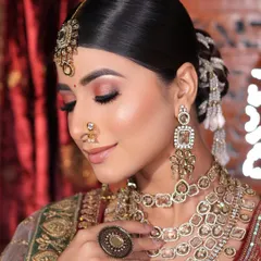 A soft and romantic eye makeup look with shades of pink and a subtle shimmer. This style is perfect for a daytime wedding or engagement.