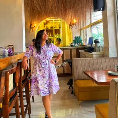 Part of my summer collection, this lavender floral print shirt dress is made from lightweight cotton. It's a perfect example of a comfortable, stylish, and custom-fit casual dress for warm weather.