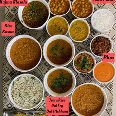 A large order of various main course dishes including BisiBele Bhath, Rajma Masala, Dal Makhani, Dal Fry, Jeera Rice, and Tawa Pulao.