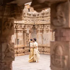 Amidst the timeless architecture of a South Indian temple, the couple shares an intimate moment. I love using grand locations to frame the personal story of your love.