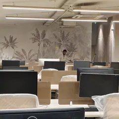 This image shows a large botanical mural in an office setting, creating a refreshing and calm atmosphere for employees. I work carefully around existing fixtures and furniture.