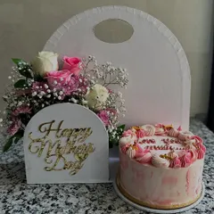 For Mother's Day, I offer more than just a cake. This gift set combines a beautiful custom cake with a fresh floral arrangement, creating a complete and elegant present that truly shows your appreciation.