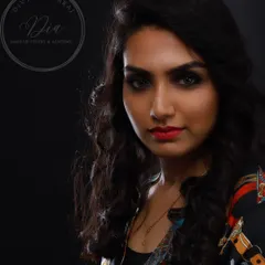 This is my signature classic smoky eye, perfect for a cocktail party or any evening event. I paired the intense, beautifully blended eye makeup with a bold red lip and contoured cheeks for a look that is pure glamour.