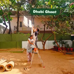 As part of their fundraiser for People for Animals, children hang up freshly tie-dyed t-shirts to dry, a setup they called their "Dhobi Ghaat."