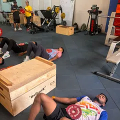 Here, I'm guiding Haryana Steelers players through diaphragmatic breathing exercises. This isn't just for relaxation. It's a tool to activate the parasympathetic nervous system for faster, more complete recovery.