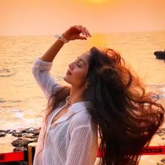 It's not all parties. We also chase moments like this. Finding the perfect sunset spot, feeling the salty air in your hair, and just soaking it all in. This is the balance of wild nights and peaceful moments that my trips are all about.
