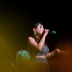 A beautiful, artistic shot from a wedding performance. I specialize in singing romantic Bollywood songs that are perfect for such an occasion.