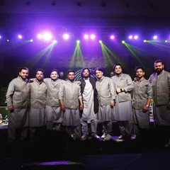 A post-performance group photo. The smiles on our faces reflect the joy and unity we feel after sharing our music with an appreciative audience.