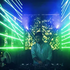 The laser and light show is an integral part of my performance. Here, the lights create a cage of energy around me as I command the decks.