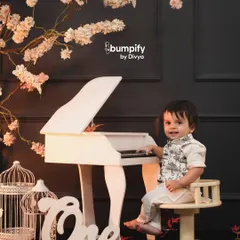 A little maestro in the making! For his first birthday, we created this elegant piano themed studio shoot. It's a unique and charming way to celebrate a big milestone.