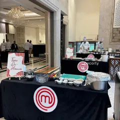 This is the Masterchef Challenge in full swing. I set up professional, branded cooking stations complete with all necessary ingredients and equipment, allowing your team to dive right into the action.