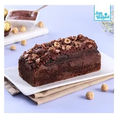 My Ferrero Nutella Teacake is pure indulgence. It's a moist chocolate teacake loaded with Nutella, Ferrero Rocher, and roasted hazelnuts.