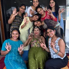 A happy bride surrounded by her friends and family, all showing off their beautiful mehendi designs. I love being a part of these joyful moments.