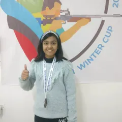 A thumbs-up for a job well done. One of our young medal winners at the TOPGUN WINTER CUP 2023, celebrating her achievement and ready for the next challenge.