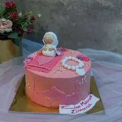 Another beautiful Ramadan cake for a little girl, featuring a cute fondant figure in a hijab.