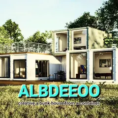 A creative bunk house made from stacked shipping containers. This concept features a rooftop terrace and large glass walls, turning industrial materials into a stylish home.