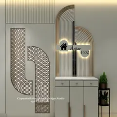 A unique entryway design featuring a custom jali-patterned panel and a modern, illuminated nameplate. This creates a grand and personalized first impression.