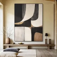 A beautiful example of minimalist abstract art. The interplay of black, white, and beige curves creates a sophisticated and balanced composition, ideal for a serene and modern interior.