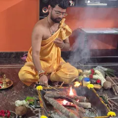 Performing a Shatru Samhara homa. This is a powerful fire ritual aimed at neutralizing negative energies and overcoming adversaries.