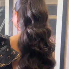 Another angle of the high ponytail, showing its length and the beautiful flow of the waves.