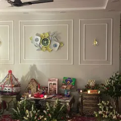 A look at the welcome area for a bride. I decorated the space with floral arrangements, gifts, and candles to ensure the celebration starts from the moment she steps in.