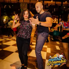 A great moment of connection between two dancers at our social night. Our community events are the perfect place to practice your leading and following skills in a real-world setting.