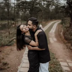 A happy, candid embrace during a pre-wedding shoot in a beautiful natural setting. I focus on capturing the genuine smiles and laughter that define your relationship.