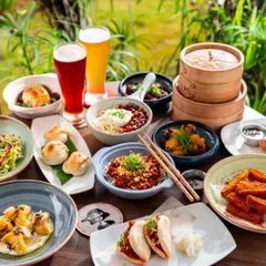A full table spread for a pop-up at Common House Karjat. I arranged the dishes, from baos to noodles and beers, to create a vibrant and abundant feast that showcases the variety and quality of the menu.