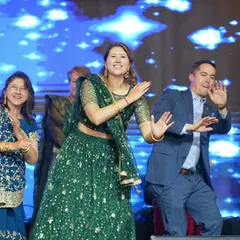 Another happy moment from a family group dance. We coordinate formations and steps so that large groups look synchronized and professional, creating a huge impact at the Sangeet.