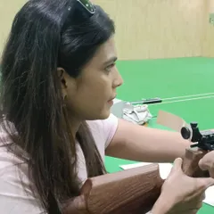 Another shot of champion Trupti Murgunde preparing to shoot. Her visit was a great reminder that the spirit of a champion shines through in any sport.
