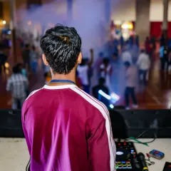 A view from behind me, looking out at the crowd through a haze of smoke. This is my perspective on a great party.