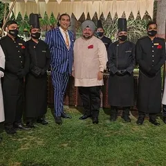 My team and I with designer JJ Valaya. I ensure that my entire staff, from chefs to servers, is aligned with the high standards of service required for luxury events.