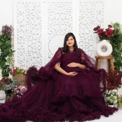 Feel like royalty in one of my lavish gowns. This portrait was taken in my Jaipur studio, using an elaborate floral set to create a rich, luxurious atmosphere for this special memory.