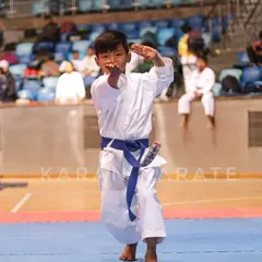 A moment of pure focus from one of my national-level players during a Kata competition. This image captures the precision and artistry that competitive karate demands at the highest levels.