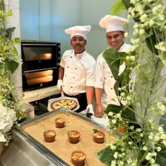Our chefs, ready to serve fresh, wood-fired pizza from a dedicated live oven station. This popular option brings a casual yet gourmet feel to corporate gatherings and parties.
