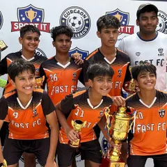 The victorious U13 Blue team, winners of the Gurgaon Youth League. Each player holds their well-earned trophy, marking a successful campaign built on teamwork and skill.