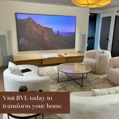 A view of the main demonstration area at the Jive showroom. Visit us to see how a large-screen display and high-end audio can be elegantly integrated into a comfortable, modern living space.