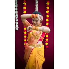 This client is styled for a traditional ceremony, showcasing how I coordinate the entire look. The makeup, hairstyle, and perfectly draped saree come together to create a cohesive and graceful appearance.