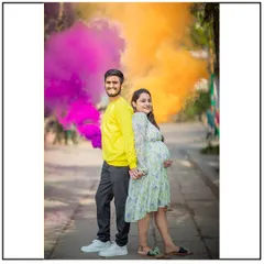 A vibrant and exciting gender reveal using colored smoke bombs. This is a fun and creative way to announce your baby's gender.