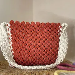 This is one of my bestselling designs, and I can see why. The warm, burnt-orange color is contrasted beautifully with the off-white strap and scalloped edging, creating a perfect boho shoulder bag.