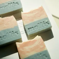 Meet Aqua, my ocean-inspired soap bar. It has a fresh, crisp scent reminiscent of a salty sea breeze, and is colored with natural pink and blue clays.
