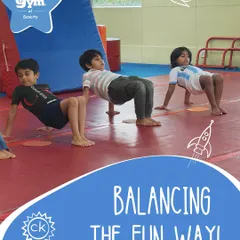 Balancing the fun way. A group of preschoolers practices a tabletop pose, building core strength, stability, and learning to move in sync with their friends.