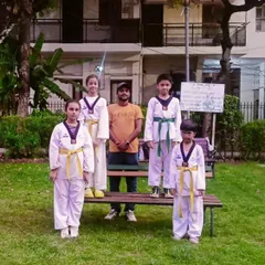 Posing with my students after their successful belt promotion. They have all worked very hard to reach this level.